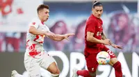 Namun pemain berusia 23 tahun itu akhirnya mampu membungkam para penyinyir dengan tampil moncer ketika The Reds bersua RB Leipzig. (AFP/Ronny Hartmann)