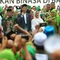 Presiden Joko Widodo bersama Ibu Negara Iriana, Menag Lukman Hakim Saifuddin, Ketum PBNU Said Aqil Siradj, Ketum PP Muslimat NU Khofifah Indar Parawansa saat menghadiri Harlah ke-73 Muslimat NU di SUGBK, Jakarta, Minggu (27/1). (Liputan6.com/Johan Tallo)