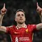 Pemain depan Liverpool asal Portugal, Diogo Jota melakukan selebrasi setelah mencetak gol saat pertandingan putaran ketiga Piala Liga Inggris melawan West Ham United di Stadion Anfield, Liverpool, Inggris pada 25 September 2024. (Paul ELLIS/AFP)