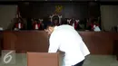 M. Nazaruddin tersangka Wisma Atlet bersiap duduk di kursi saat sidang vonis di pengadilan Tipikor, Jakarta,Rabu (15/6) Nazarudin divonis 6 tahun penjara denda 1 miliar subsider 1 tahun. (Liputan6.com/Helmi Afandi)