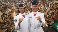 Paskibraka asal Kalimanten Timur Ferina Julia Syarif dan Alfares Deo Simangunsong. (Liputan6.com/Aditya Eka Prawira)
