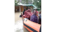 Banjir karena jebolnya tanggul Sungai Citarum, Minggu (21/2/2021). (dok BNPB)