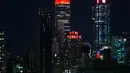 Empire State Building menyala merah untuk menandai Hari Inklusi di New York, Amerika Serikat, Jumat (20/7). (Kena Betancur/Light Up For Inclusion/AFP-Services)