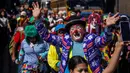 Perayaan ini sebagai penghargaan bagi para badut di El Salvador atas upaya mereka dalam menciptakan kegembiraan. (Camilo FREEDMAN/AFP)