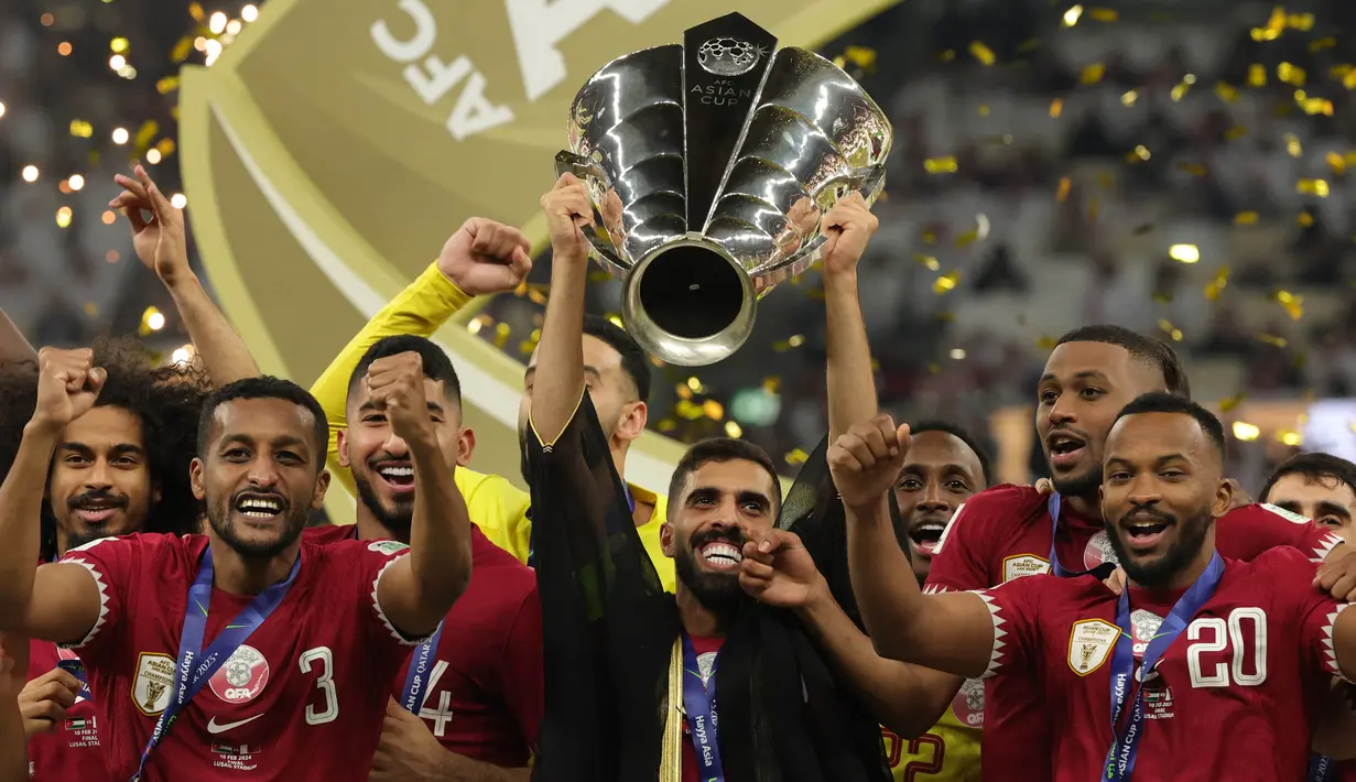Qatar memastikan kemenangan atas Yordania dengan skor 3-1 dan berhasil mempertahankan status sebagai juara Piala Asia yang pernah diraih sebelumnya pada 2019. (Giuseppe CACACE/AFP)
