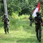 Prajurit TNI berpatroli di perbatasan RI-PNG, di Papua. (Foto: Liputan6.com/Dok. Kostrad)