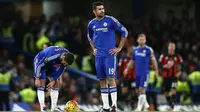 Sang juara bertahan Chelsea harus terpuruk di posisi 15 klasemen sementara Liga Inggris. Dari 17 pertandingan The Blues sudah menelan kekalahan sebanyak sembilan kali. (AFP/Justin Tallis)
