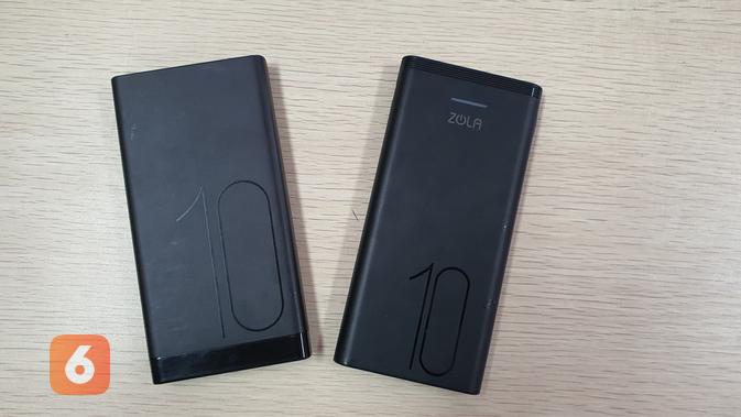 Powerbank Zola Hero 10.000mAh (kanan) dan powerbank milik Huawei hadir dengan desain yang mirip. (Liputan6.com/ Agustin Setyo W)