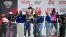 Tim Balap Yart Yamaha Official merayakan kemenangan di atas podium dalam ajang 24 Hours of Le Mans yang berlangsung di Sirkuit Bugatti, Prancis, 19 April 2026 waktu setempat. (AFP/Julien De Rosa)