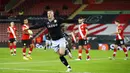 Pemain Aston Villa Ross Barkley melakukan selebrasi usai mencetak gol ke gawang Southampton pada pertandingan Liga Inggris di Stadion St. Mary, Southampton, Inggris, Sabtu (30/1/2021). Aston Villa menang 1-0. (Michael Steele/Pool via AP)