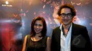 Aktor Agus Kuncoro dan istrinya, Anggia Jelita saat menghadiri gala premiere WEWE di Epicentrum XXI, Jakarta, Senin (13/4/2015). (Liputan6.com/Faisal R Syam)