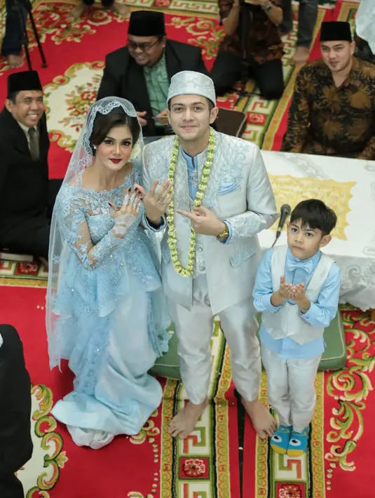 Minggu (7/1/2018) malam Rifkyd an Biby menggelar pesta pernikahan. Resepsi pernikahan di gelar meriah di  Auditorium Mutiara, PTIK, Jakarta Selatan. (Adrian Putra/Bintang.com)