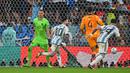Pada babak kedua, tepatnya menit ke-73 Argentina sukses menggandakan keunggulan menjadi 2-0 lewat gol Lionel Messi. Gol dicetak lewat eksekusi penalti usai Marcos Acuna dilanggar Denzel Dumfries di dalam kotak penalti. (AFP/Alberto Pizzoli)