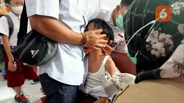vaksinasi usia 6 - 11 di Kota Palu