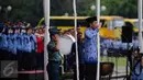 Presiden Jokowi bertindak sebagai Inspektur upacara peringatan HUT ke-45 Korps Pegawai Republik Indonesia (Korpri) di Silang Monas, Jakarta, Selasa (29/11). Acara dihadiri ribuan PNS lintas instansi berpakaian adat. (Liputan6.com/Faizal Fanani)