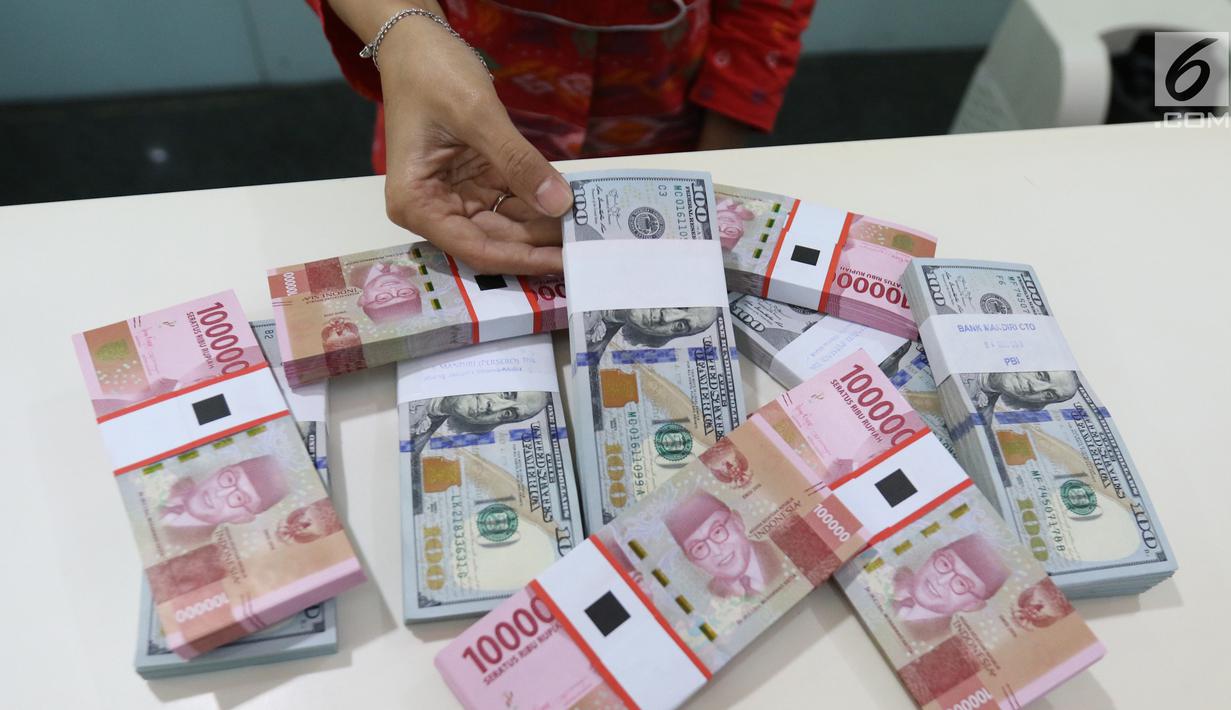 FOTO: Rupiah Tetap Berada di Zona Hijau - Bisnis Liputan6.com