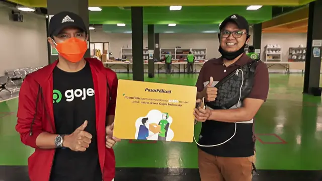 PasarPolis Bagi-Bagi 10.000 Masker ke Driver Gojek. Dok: PasarPolis