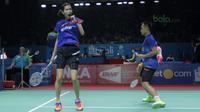 Ekspresi Gloria Emanuelle saat mengalahkan pasangan Denmark, Mathias Chrisyensen/Christinna Pedersen pada babak kedua Indonesia Open 2018 di Istora Senayan, Jakarta, (5/6/2018). Gloria/Hafiz Faizal menang 14-21 21-13 21-7. (Bola.com/Nick Hanoatubun)
