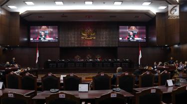Suasana sidang pendahuluan sengketa hasil Pemilu Legislatif 2019 di gedung MK, Jakarta, Rabu (10/7/2019). Sidang tersebut beragendakan pemeriksaan pendahuluan terkait Perselisihan Hasil Pemilihan Umum DPR-DPRD Provinsi Sulawesi Barat. (Liputan6/Johan Tallo)
