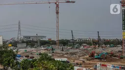 Suasana proyek pembangunan Jakarta International Stadium (JIS) atau Stadion BMW di kawasan Papanggo, Tanjung Priok, Jakarta, Senin (2/12/2019). Pembangunan proyek Stadion BMW telah mencapai tahap pemasangan tiang pancang di struktur bawah dengan persentase 7,1 persen. (Liputan6.com/Faizal Fanani)