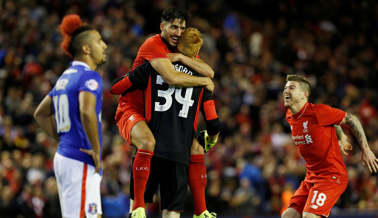 Pemain Liverpool merayakan kemenangan atas Carlisle United dalam putaran ketiga Piala Liga Inggris di Stadion Anfield, Inggris, Rabu (23/9/2015). (Action Images via Reuters/Craig Brough)