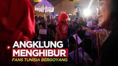 Berita video alunan musik angklung bergema di Doha, Qatar, dan menghibur salah satunya fans Timnas Tunisia yang hadir untuk Piala Dunia 2022, Jumat (18/11/2022).