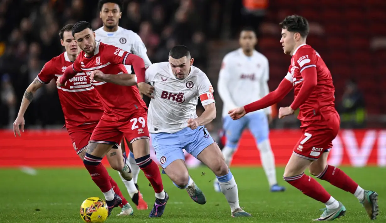 Aston Villa berhasil meraih kemenangan kontra Middlesbrough dengan skor tipis 1-0. Gol kemenangan Aston Villa dicetak oleh Matty Cash (87’). (Oli SCARFF/AFP)