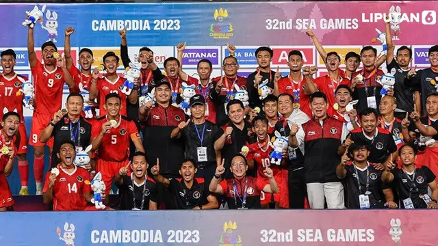 Banner Infografis Timnas Indonesia U-22 Raih Medali Emas SEA Games 2023. (Foto: Nhac NGUYEN / AFP)