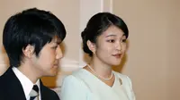 Putri Mako dan Kei Komuro. (dok. Shizuo Kambayashi / POOL / AFP)