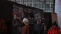 Mereka mengecam tindakan penghilangan paksa dan gentrifikasi yang menurut mereka semakin intensif menjelang Piala Dunia 2026. (AFP/Yuri Cortez)