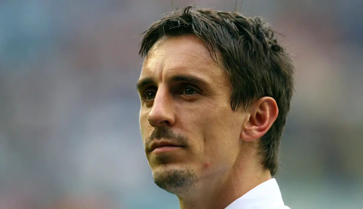 4. Gary Neville - Legenda Setan Merah tersebut punya kebiasaan unik selama pertandingan. Salah satunya ialah menggunakan sepatu yang sama selama satu musim penuh. (AFP/Paul Ellis)