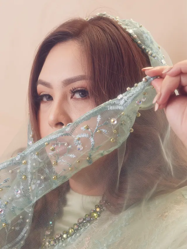 Audy meluncurkan single Tobat