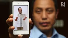 Foto tersangka Direktur Utama PT TP berinisial DHR (50) karena telah menyebabkan kerugian negara senilai Rp6,3 miliar diperlihatkan saat penyerahan berkas tersangka kasus tindak pidana perpajakan di Jakarta, Rabu (2/8). (Liputan6.com/Immanuel Antonius)