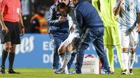 Lionel Messi cedera parah saat Argentina berhadapan dengan Honduras (AFP)