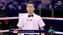 Wasit Indonesia, Muhammad Arisa Putra Pohan saat memimpin pertandingan semifinal tinju Olimpiade Paris 2024 di North Paris Arena, Villepinte, Prancis, Jumat (02/08/2024). (Dok. NOC Indonesia)