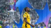 Pemain Inter Milan, Marcus Thuram, tampak lesu setelah gagal meraih trofi Liga champions 2024/2025 di Stadion Allianz Arena, Minggu (01/06/2025) dini hari WIB. (AP Photo/Martin Meissner)