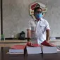 Direktur Reskrimsus Polda Riau Kombes Andri Sudarmadi memperlihatkan berkas tersangka kebakaran lahan PT Berlian Mitra Inti. (Liputan6.com/M Syukur)