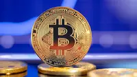 Ilustrasi aset kripto Bitcoin. (ParStud/depositphotos.com)