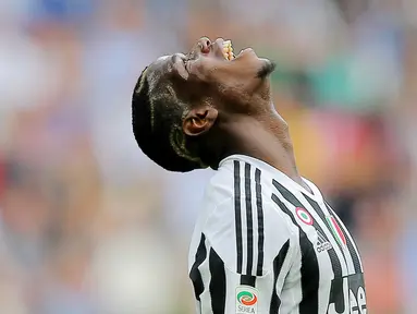 Juventus akan kembali kedatangan mantan pemain andalannya pada periode 2012-2016 yakni Paul Pogba. Pemain Timnas Prancis itu enggan memperpanjang kontrak di MU dan memutuskan akan kembali memperkuat Si Nyonya Tua musim depan. (AFP/Marco Bertorello)