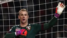 Joe Hart disarankan untuk tetap melanjutkan karier di Italia. (AFP/Marco Bertorello)