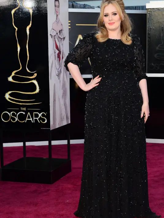 Menurut Adele memiliki anak adalah komitmen yang besar, ia juga mengaku hubungannya dengan sang kekasih baik-baik saja. (AFP/Bintang.com)