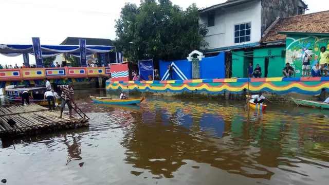 Kampung Mural Palembang di Tepian Sungai Beraroma Menyengat