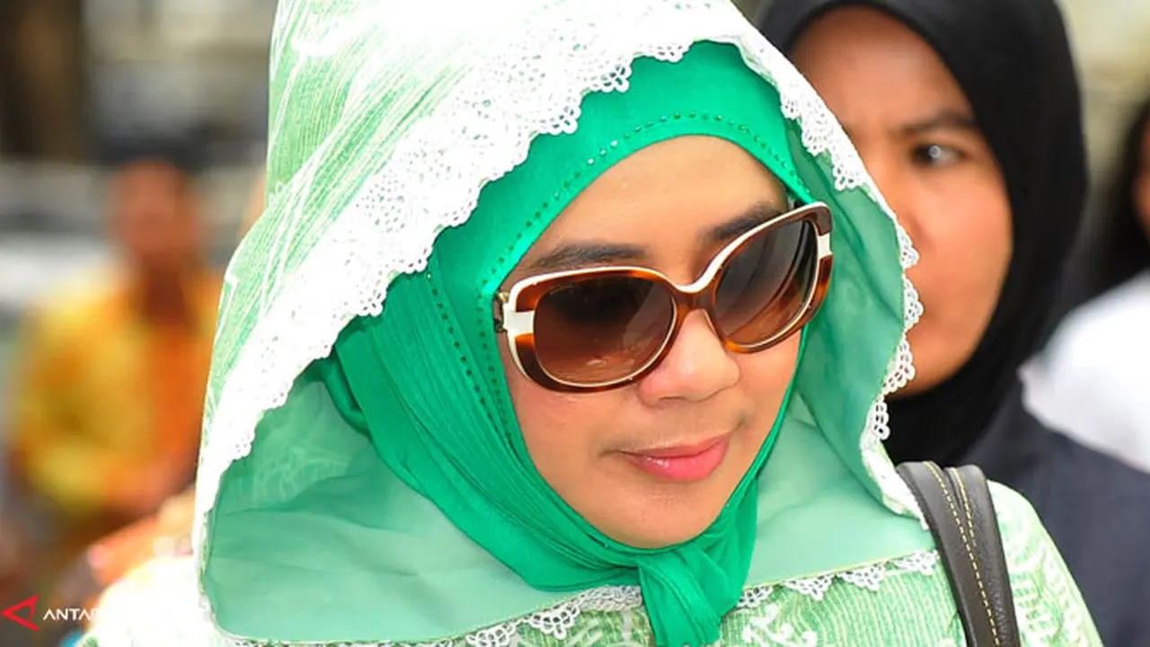 istri-rusli-syarifah-130626b.jpg