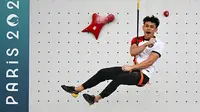 Atlet panjat tebing Indonesia, Veddriq Leonardo merayakan kemenangan pada babak final cabang olahraga pajat tebing nomor speed Olimpiade Paris 2024 di Le Bourget Sport Climbing Venue, Paris, Prancis, Kamis (08/08/2024). (AFP/Fabrice Coffriri)