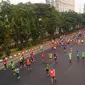 Peserta sedang berlari ruas jalan dalam acara Jakarta marathon 2015. (TMC Polda Metro Jaya)