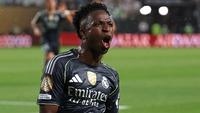 Pemain Real Madrid, Vinicius Jr, melakukan selebrasi seusai membobol gawang Salzburg pada lanjutan Piala Dunia Antarklub 2025, Jumat (27/6/2025) pagi. (FRANCK FIFE / AFP)