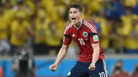 James Rodriguez berhasil mencuri perhatian di Piala Dunia 2014 Brasil dengan sepakan volley spektakuler saat melawan Uruguay. Tidak itu saja pemain asal Kolombia ini juga tercatat sebagai pencetak gol terbanyak dengan mengoleksi 6 gol. (AFP/Eitan Abramovich)