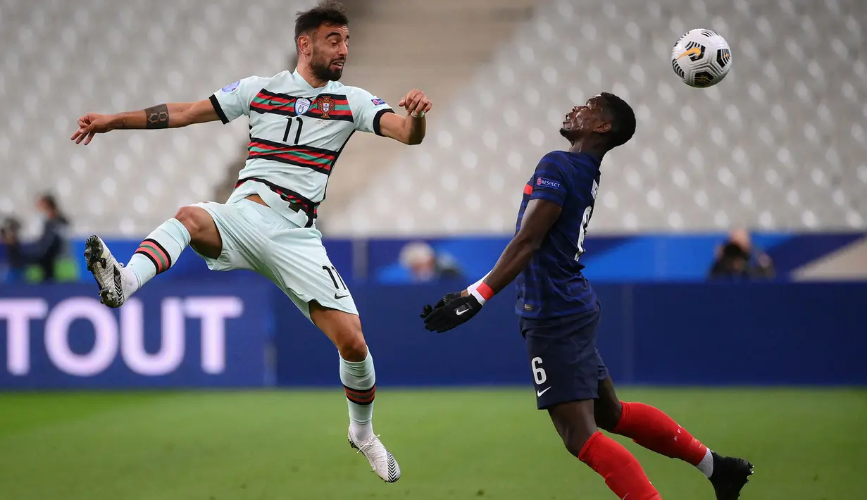 Alasan keempat adalah sarang bintang di lini tengah mereka. Bruno Fernandes yang tampil apik bersama MU musim ini, diprediksi akan menunjukkan kualitasnya bersama Danilo Pereira, Joao Moutinho, Sergio Oliveira, William Carvalho, Ruben Neves dan Renato Sanches. (Foto: AFP/Franck Fife)