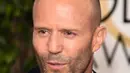 Baik Jason Statham maupun sang kekasih hadir di acara Golden Globe Awards 2016 untuk mendukung teman-temannya di industri.  Pasangan Inggris ini dikabarkan mendarat di Los Angeles pada Jumat jelang acara besar ini. (AFP/Bintang.com)