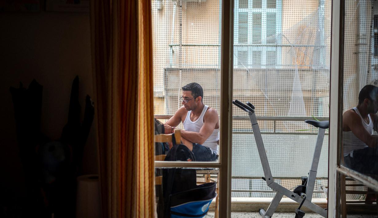 "Tak ada yang tak mungkin" kata perenang 32 tahun itu. Ia juga menambahkan bahawa semua orang bisa mendapatkan apapun yang diinginkan ketika meraka berjuang dengan tubuh dan hatinya. (Foto: AFP/Angelos Tzortzinis)